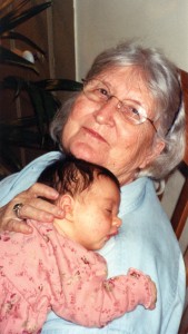 Brink cuddles one of her 19 great-grandchildren.