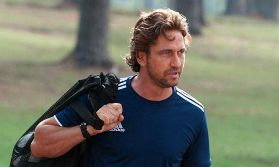 Gerard Butler prepares to hit the practice field in "Playing for Keeps."