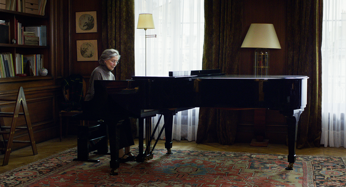 Emmanuelle Riva plays piano in her home before illness strikes in Amour.