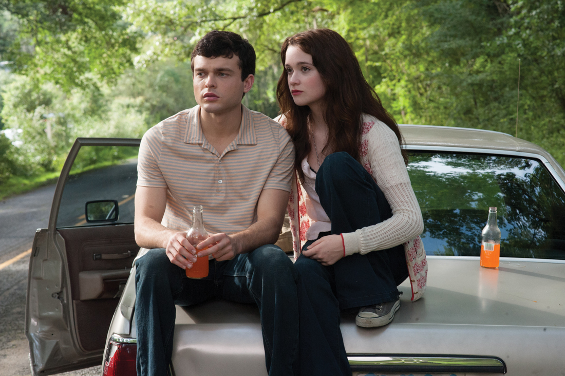 Alden Ehrenreich and Alice Englert cast a look at the road out of town in Beautiful Creatures.