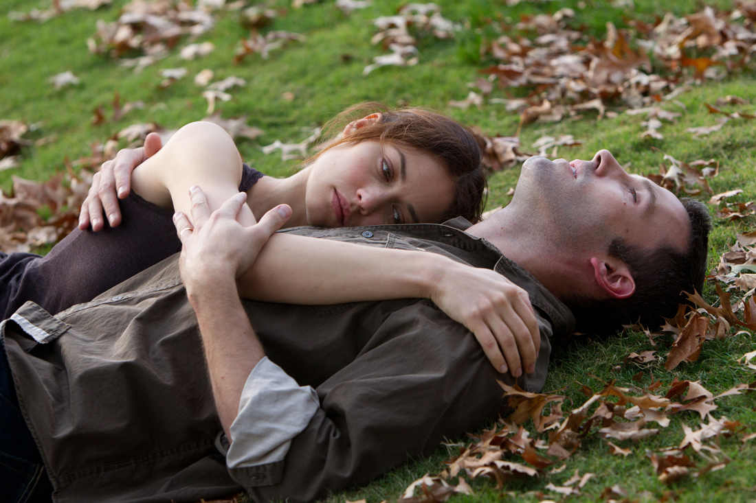 Olga Kurylenko and Ben Affleck share one of many pensive moments in To the Wonder.