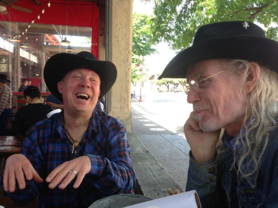 Bill Werngren (left) and James Michael Taylor hang out in the Stockyards. Courtesy Jeannette Stewart