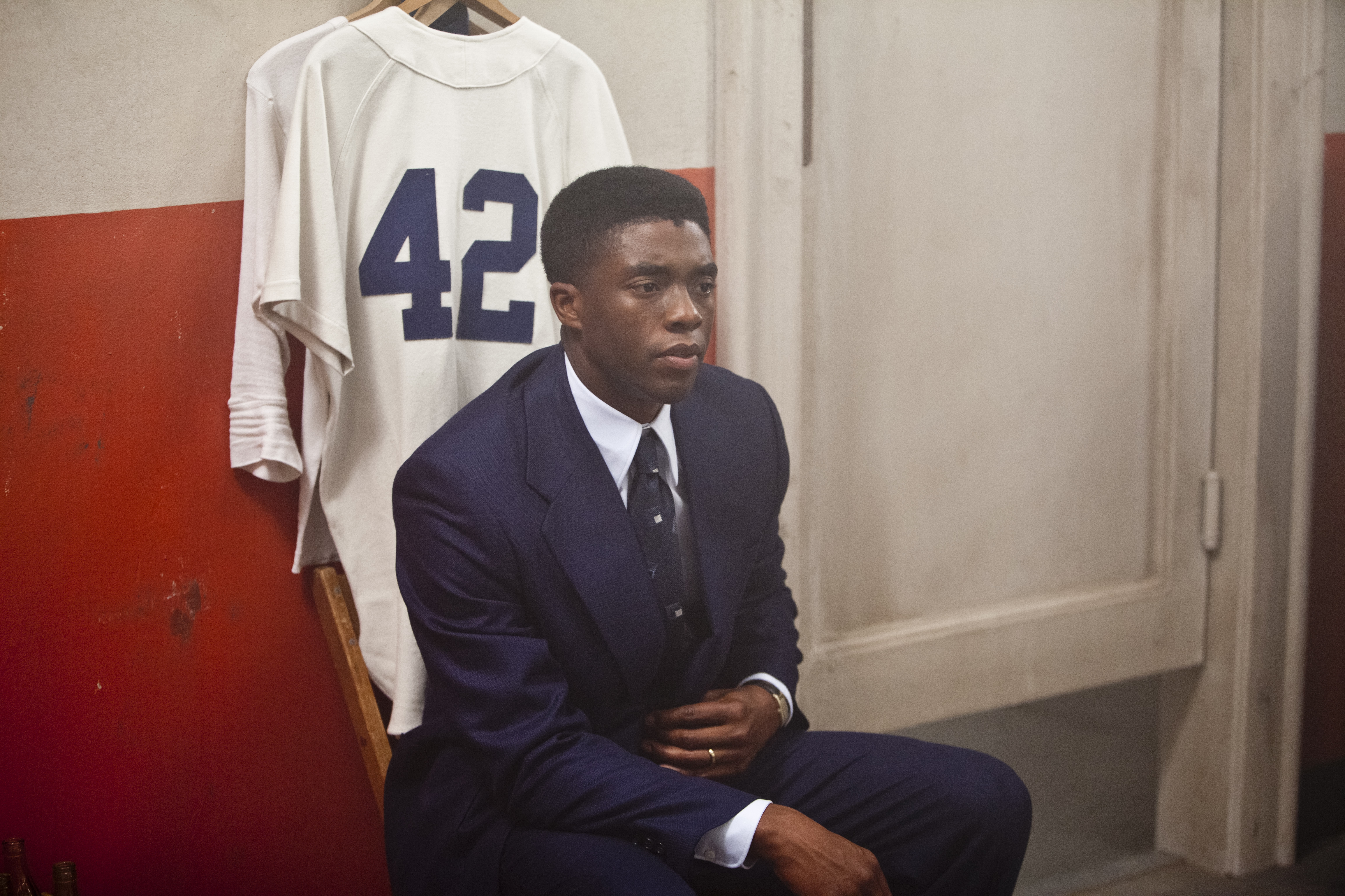 Chadwick Boseman receives his numbered Brooklyn Dodgers jersey in "42."