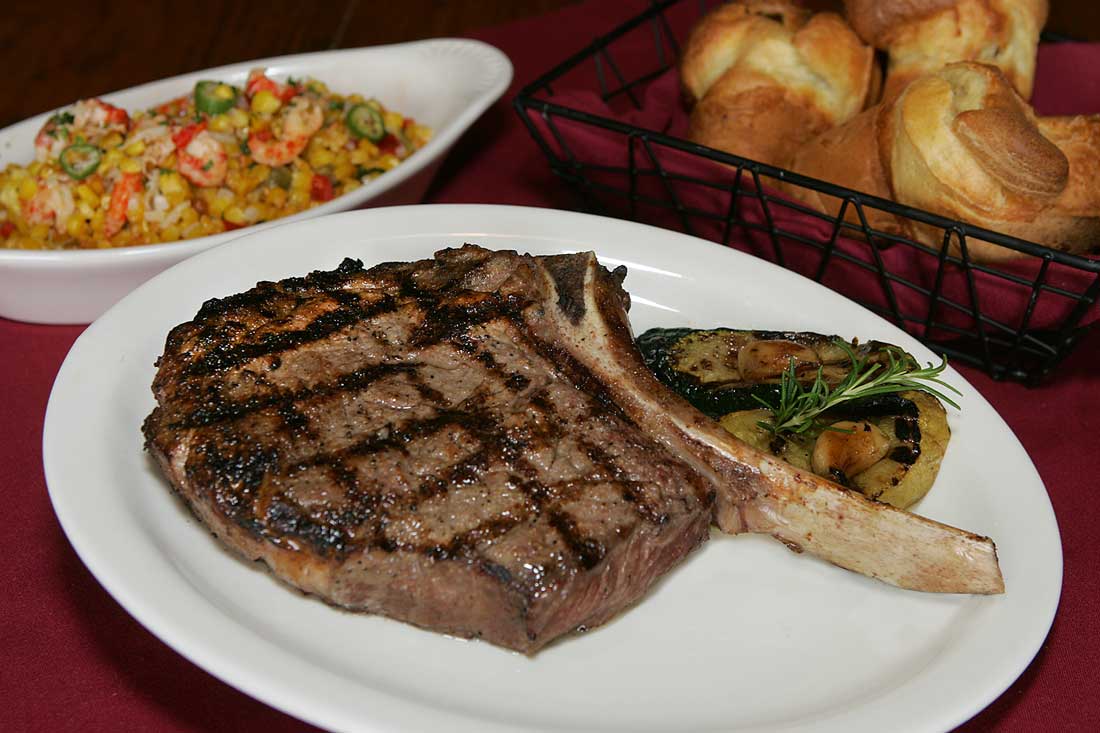 The steaks are cut on-site — and then cooked to order, like this bone-in rib-eye. Lee Chastain