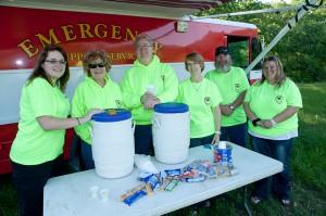 Part of the Johnson County ESS team gathers at their aid site: (left to right) Stephanie Pribble, Donna Montgomery, Harold Montgomery, Assistant Chief Grace Goodwin, Captain Bill Gray, and Melinda Weber.