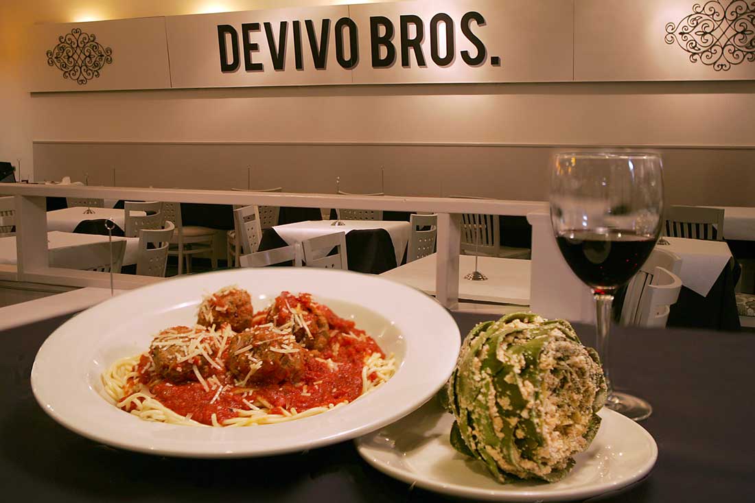 Funky and chunky: DeVivo’s spaghetti and meatballs keep company with a stuffed artichoke. Lee Chastain