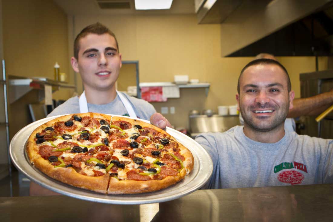 Chelsea owner Kevin Bellomo and co-worker Tim Jonuzi have got your pie right ’eeere! Tony Robles