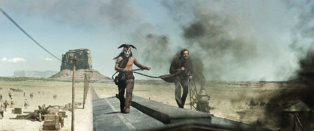 Johnny Depp and Armie Hammer try to catch up with the bad guys’ train car in The Lone Ranger.