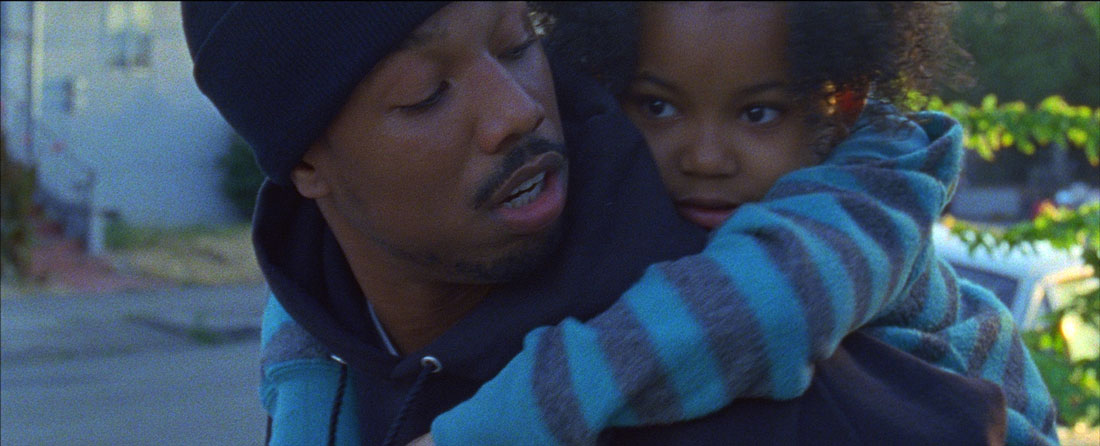 Michael B. Jordan gives Ariana Neal a piggyback ride in Fruitvale Station.