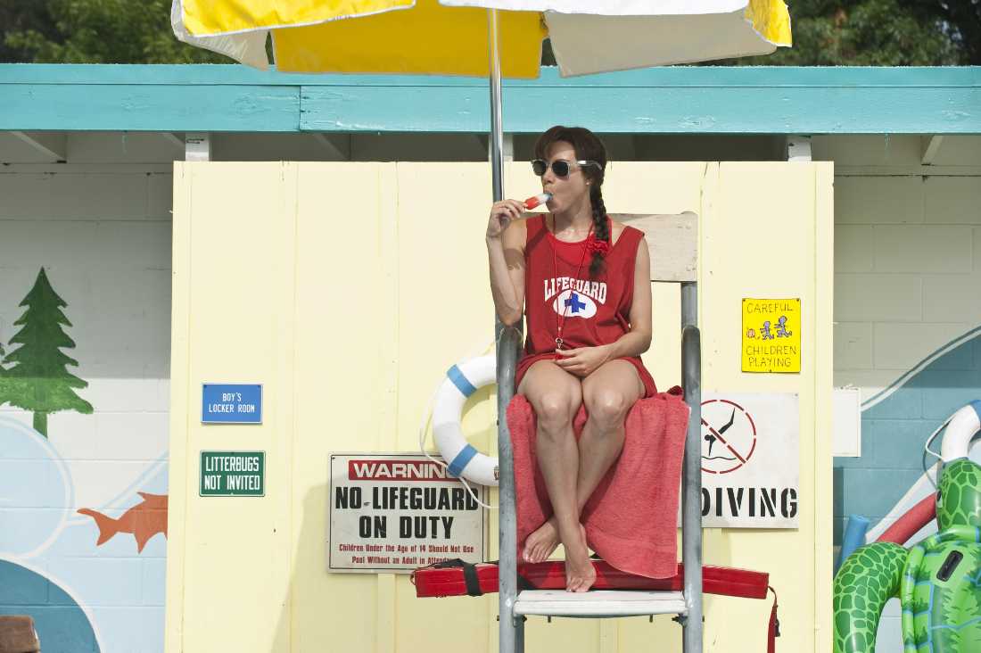 Aubrey Plaza sucks on a push pop while preparing to go through the items on "The To Do List."