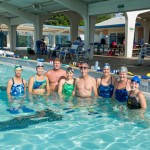 Cannell (third from right) got her swim team involved in water safety education. Left to right: Terry Woods, Elaina Rowe, Coach Chuck Burr, Sarah Mountjoy, Roger Yates, Cannell, Julie Jackson and Michelle Brannan. Brian Hutson