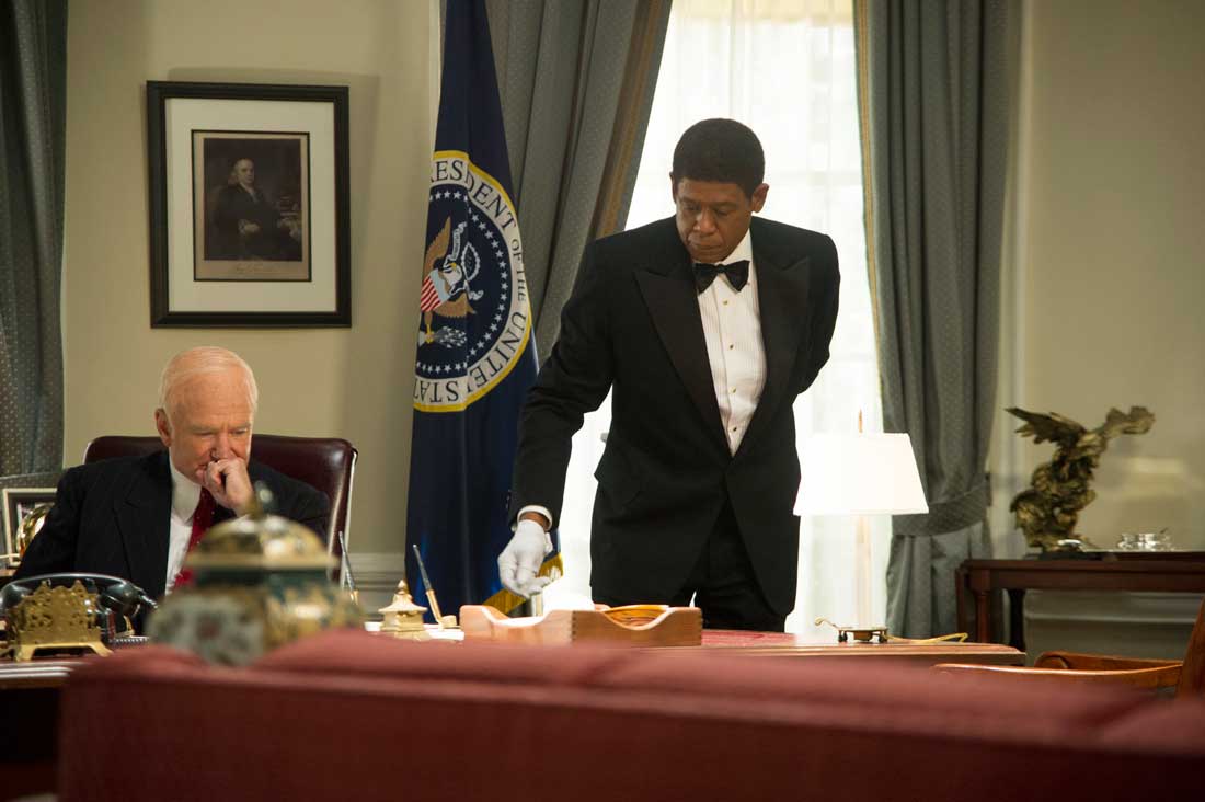 Forest Whitaker tidies up Robin Williams’ desk in the Oval Office in Lee Daniels’ The Butler.