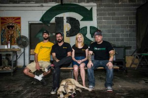 The folks at PalletSmart make fine furniture from wooden shipping pallets. Even Jake, the shop dog, is recycled (from the shelter). Brian Hutson