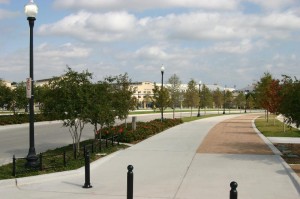 Trail Drive sports extra-wide sidewalks with an accompanying horse path, ornate light poles, and extensive landscaping.