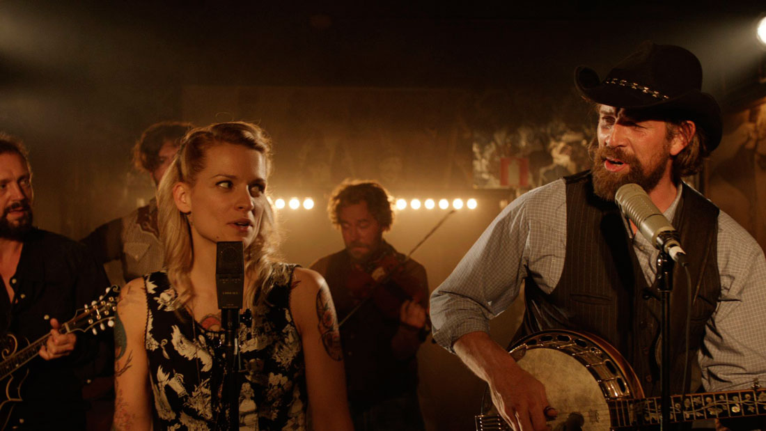 Veerle Baetens and Johan Heldenbergh sing country music in The Broken Circle Breakdown.