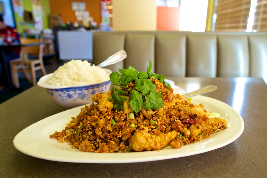 Like everything at First Chinese BBQ, the Hong Kong-style fried squid with rice is hyper-traditional. Vishal Malhotra