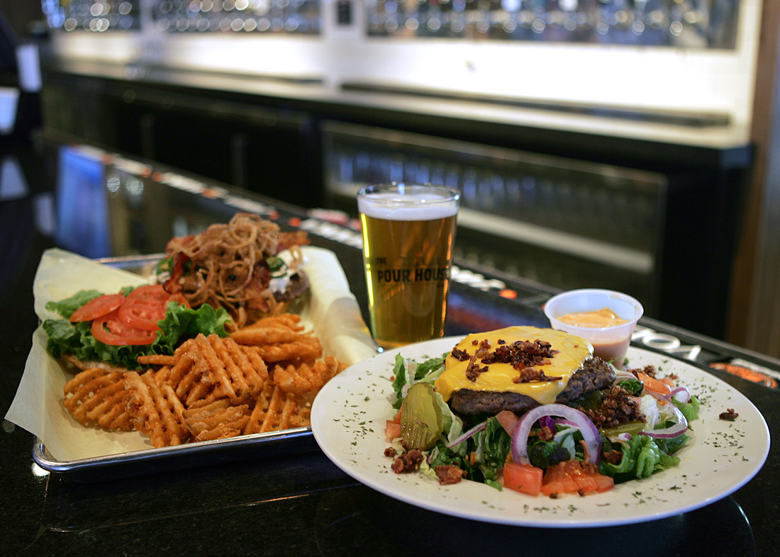 The 7th Street Burger and Eric’s Cheeseburger Salad are just a couple of The Pour House’s funky new offerings. Lee Chastain