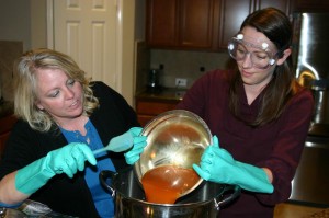 Pedroza (left) and Beebe make another batch of soap. Jeff Prince