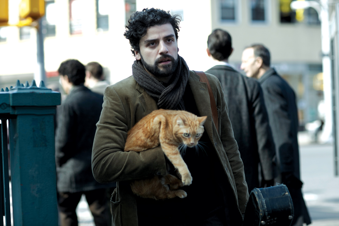 Oscar Isaac squires a housecat around Manhattan while looking for work in Inside Llewyn Davis.