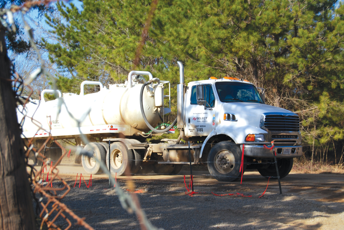 Tanker truck traffic around injection wells is just one of the reasons they’re unpopular with neighbors. Gayle Reaves