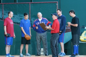 Nolan Ryan (third from left) films a spot with Olson (fourth from left) and Texas Rangers pitchers. Courtesy Brian Gagnon/Texas Rangers