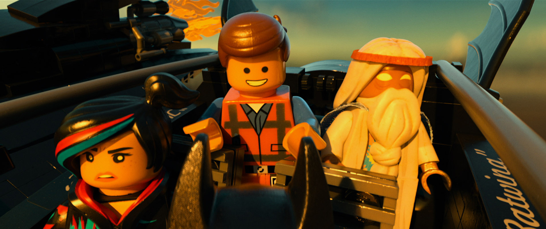 The fellowship of the brick: Wyldstyle, Emmet, and Vitruvius take a ride in the Batjet in The Lego Movie.