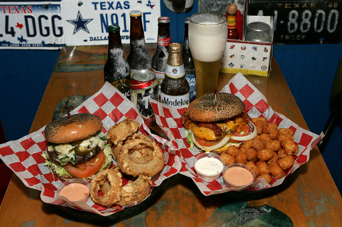 Along with the Sissy Burger, right (with bacon, cheddar cheese, mustard, and mayo, Peace Burger suggests its namesake sandwich, full of “plenty of juicy flavor.” Lee Chastain