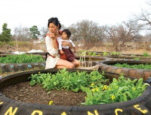 Alrutz and baby Ino sneak a fresh snack from the garden. 