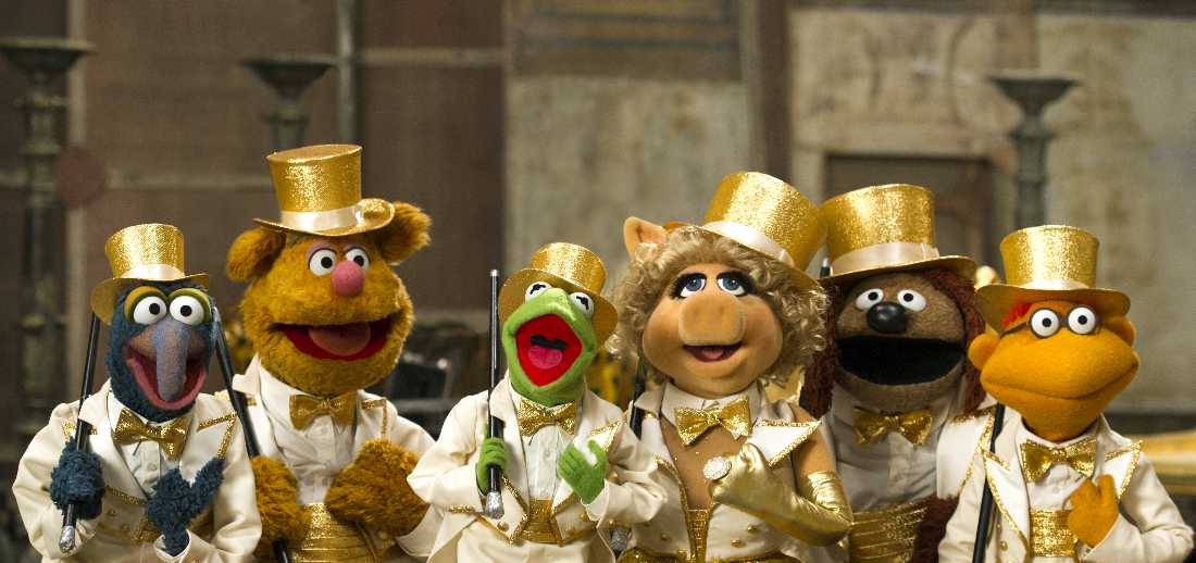 Gonzo, Fozzie, Kermit, Miss Piggy, Rowlf, and Scooter kick up their heels for a sequel in Muppets Most Wanted.