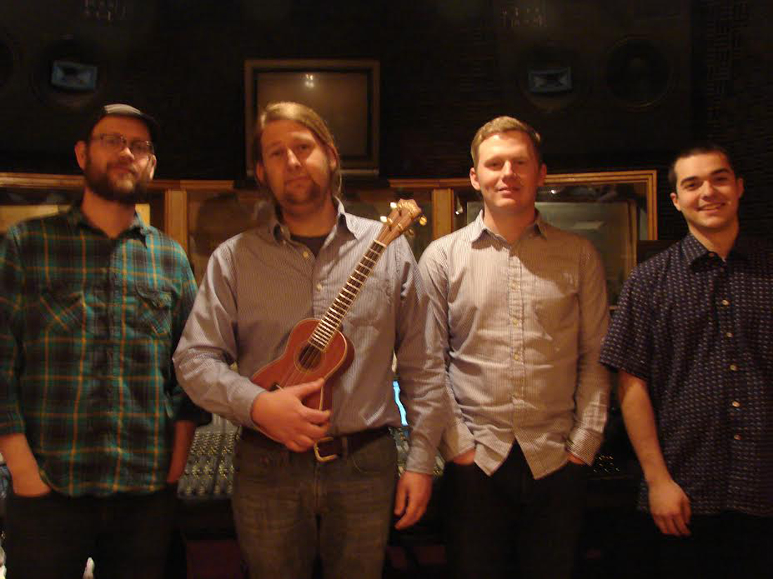 With producer Britt Robisheaux (left), Lazy Summer — (from left to right) Jeremiah Kirby, Justin Weisenborn, and Deryck Barrera — are about to release their second album.