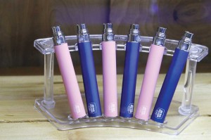 E-cig bases sit in a display case at North Texas Vapor Shop in Denton. Mouthpieces are sold separately. Melissa Wylie