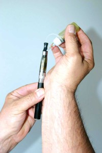 A Fort Worth resident loads his e-pen with homemade THC concentrate. Jeff Prince