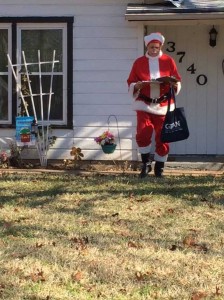 Burnam donned a Santa suit last December to tell constituents about the benefits of Obamacare. Courtesy Lon Burnam