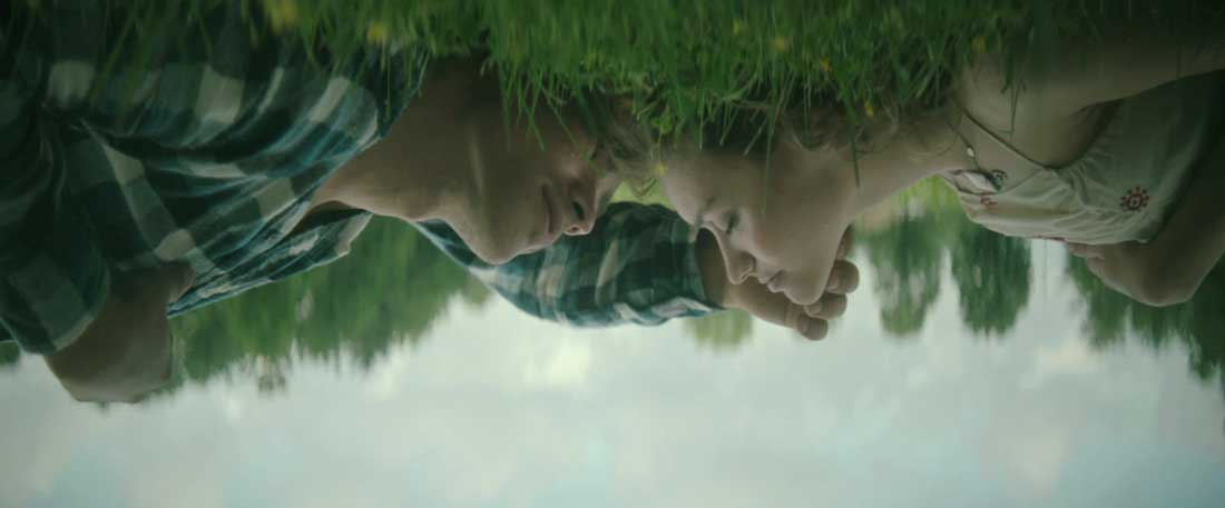 Brenton Thwaites and Olivia Cooke are filmed from a trippy angle during The Signal.
