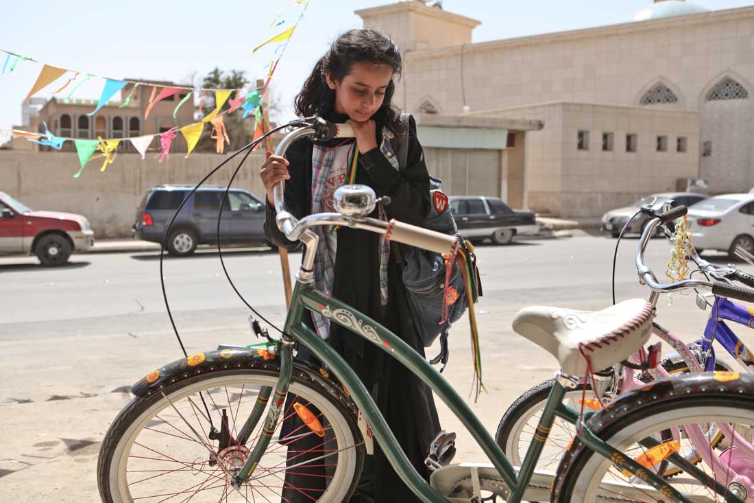 Waad Mohammed eyes a green bike and freedom in Wadjda.