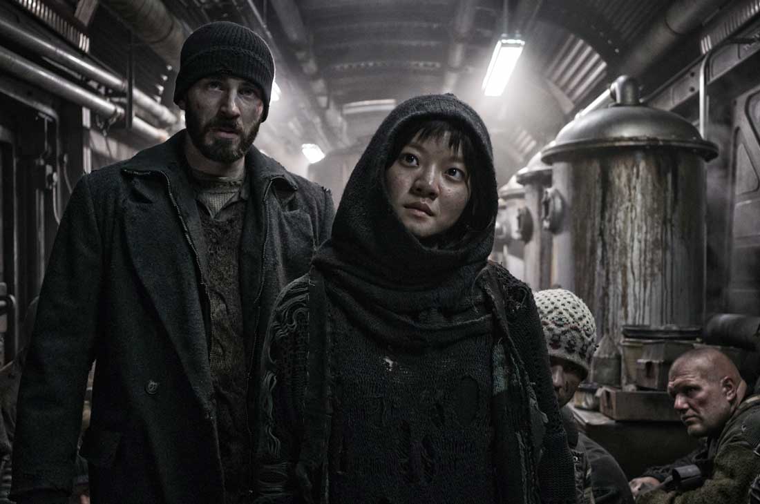 Chris Evans and Ko Ah-sung ponder how to get to the front of the train in Snowpiercer.