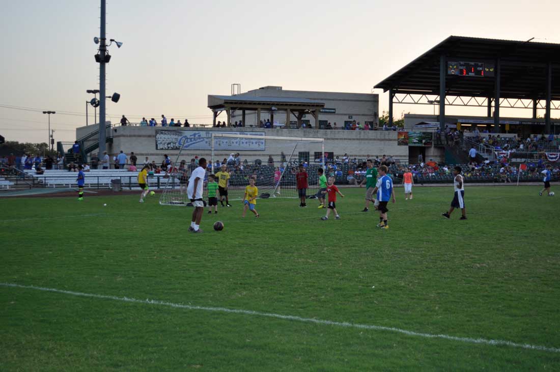 Young Vaquero fans get to cavort on the field during halftime and after games. Kenneth kost