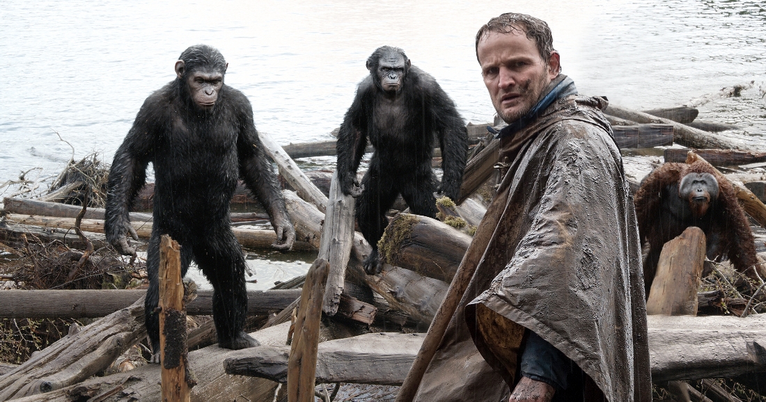 Jason Clarke (foreground) tries to make peace with our new primate overlords in Dawn of the Planet of the Apes.