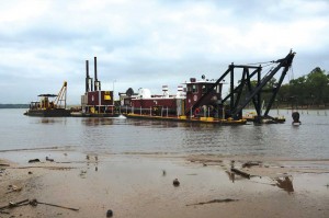 A barge carrying a dredging pump was a familiar sight on Lake Worth until recently. Courtesy Joe Waller