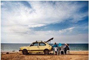 A Gazan family gathers on the beach.