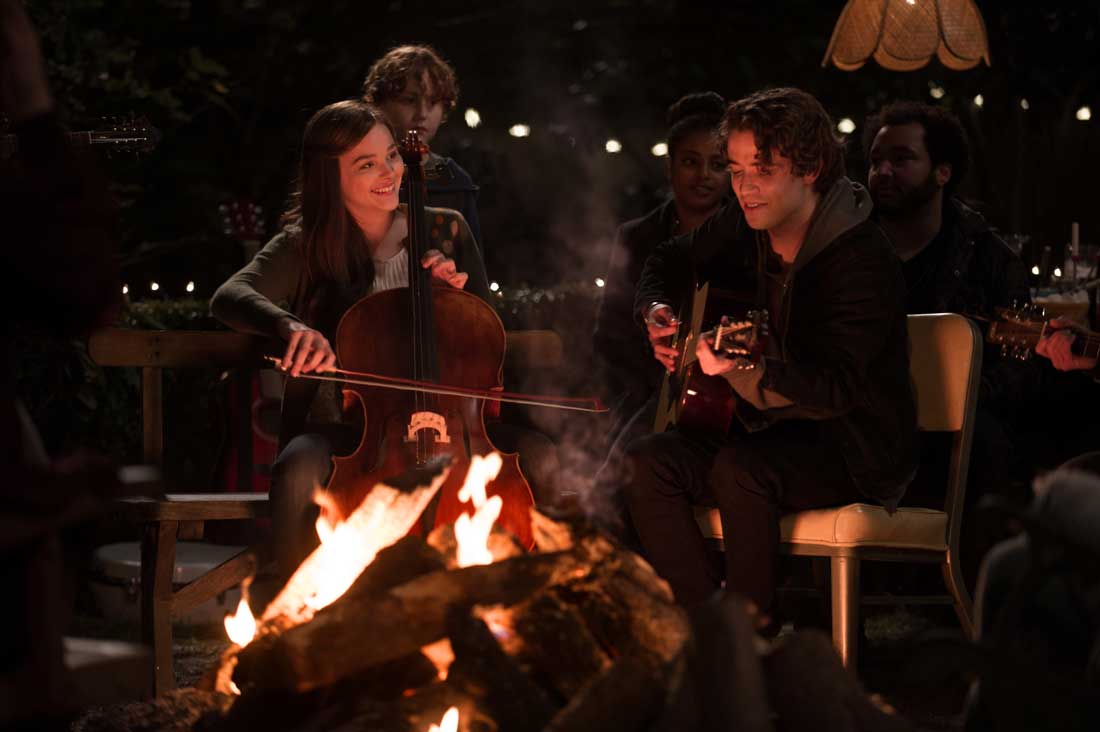 Chloë Grace Moretz and Jamie Blackley jam around a campfire in If I Stay.