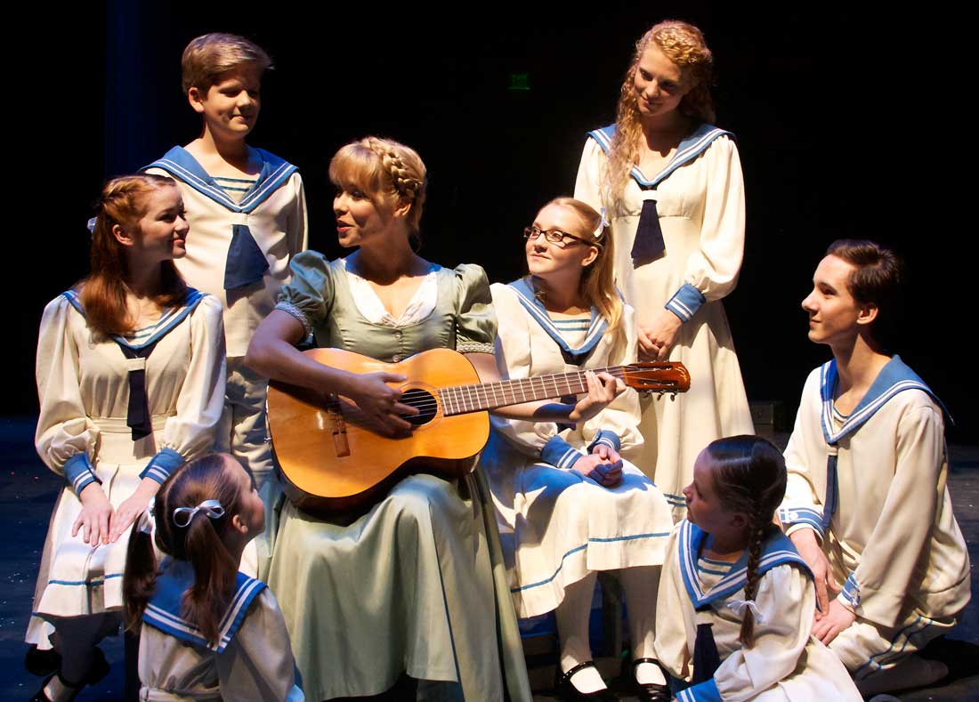 Marissa McGowan (center) teaches kids their scales in The Sound of Music.