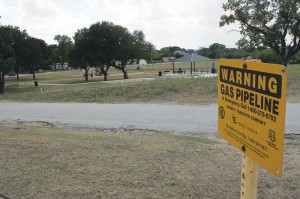 The scene at Delga Park is bucolic, but the air is full of toxic chemicals.