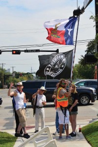 feature-1 Open Carry Tarrant County members believe carrying loaded rifles into restaurants helps build support for their cause.