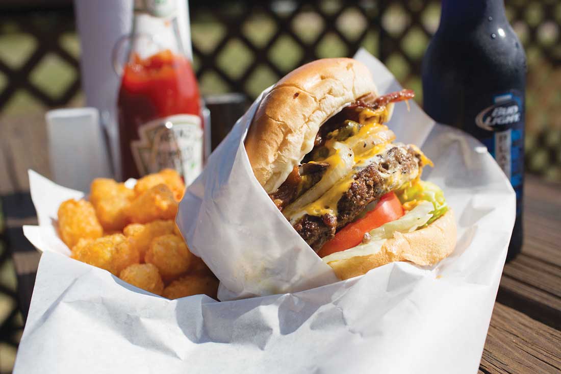 Just try to eat The Junkyard burger without a knife and fork.