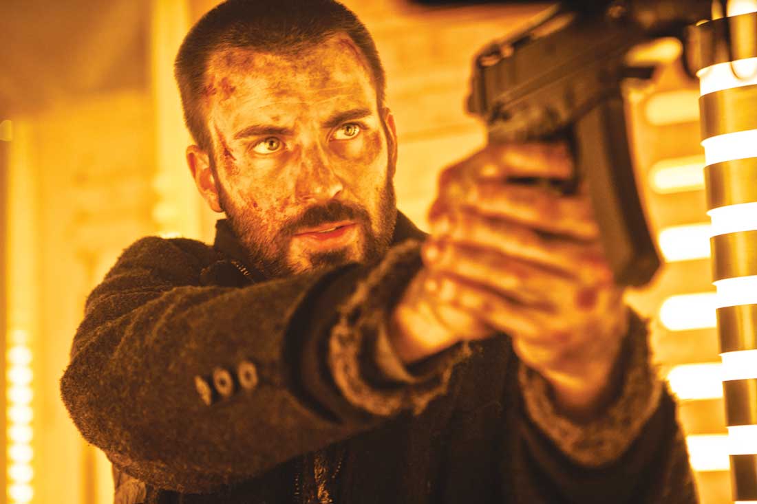 Chris Evans makes his way to the front of the train in Snowpiercer.