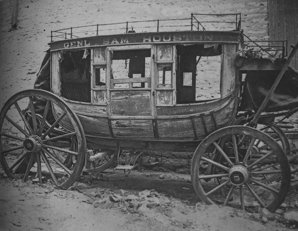 Byrd I created this postcard sometime around the 1890s using one of his photos of what was claimed to be Sam Houston’s private stagecoach. Note the image’s sharp clarity and exquisite shading and contrasts, remarkable considering the long-exposure cameras being used at the time. 