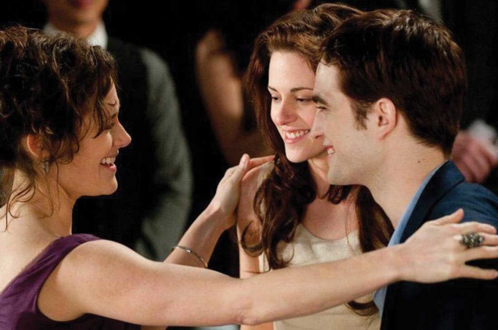 Sarah Clarke (left) acts in a scene from Twilight with Kristen Stewart and Robert Pattinson. Summit Entertainment.