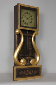 This gilt lyre wall clock will be in the largest exhibit of Joseph Ives clocks ever assembled at the NAWCC National Convention. Photo by Philip Morris.