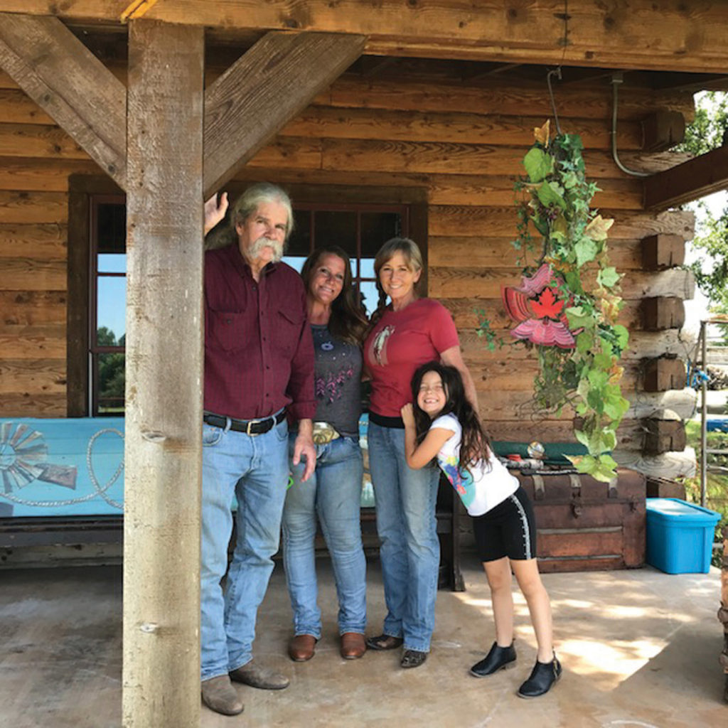 Smith, with (from left to right) Jamie Thompson, Terry Propps, and daughter Lola, has been on some sort of lifetime winning spree. Photo By Karen Gavis.